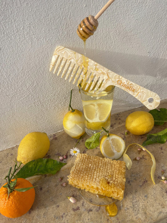 Wide tooth comb with handle in HONEY & CITRUS ZEST